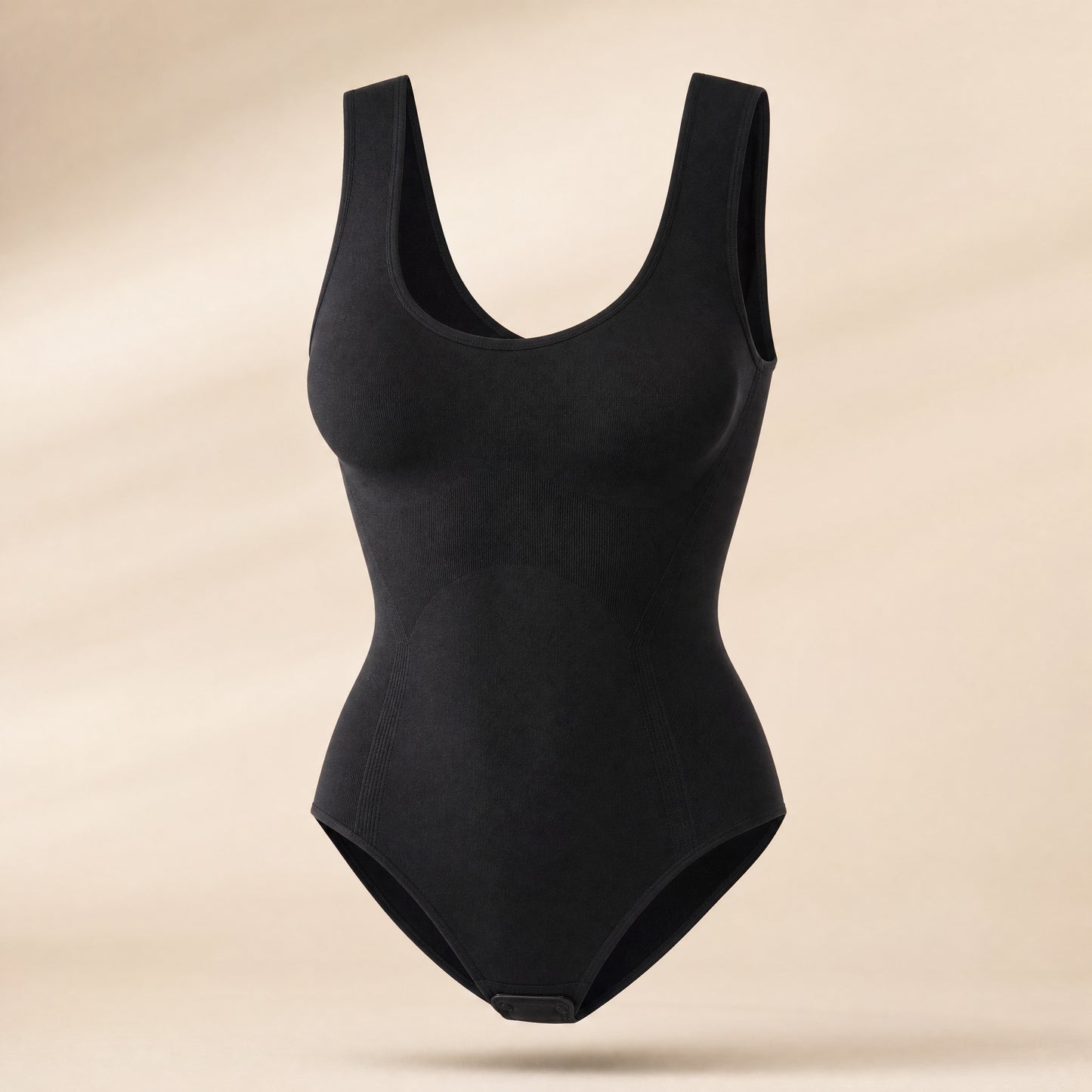 SculptEase Scoop-Neck Shaping Bodysuit in Black, studio photo on cream background