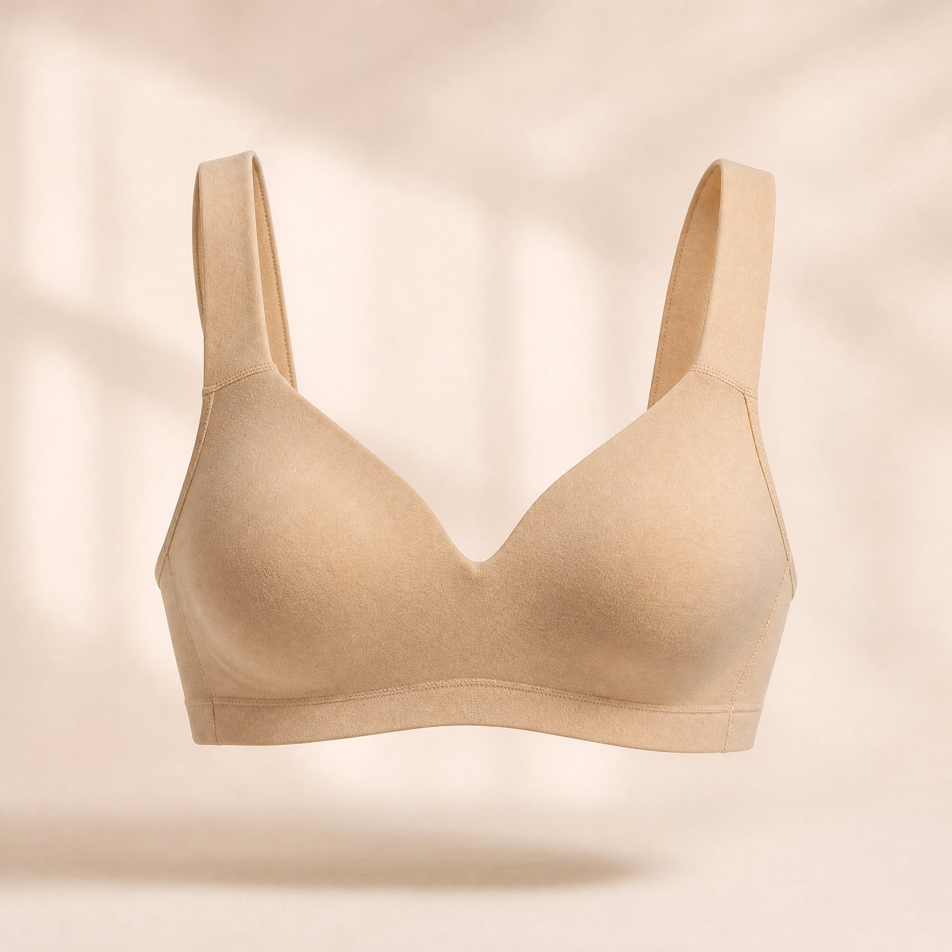 AlignSoft Support Bra in Sand, studio photo on cream background